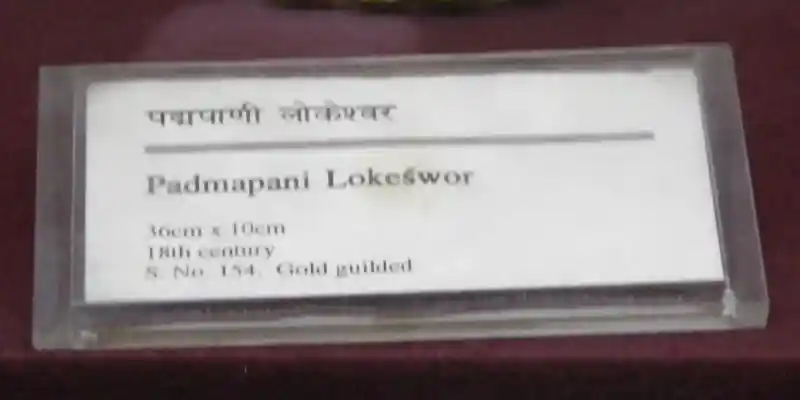 Cross necklace on a statuette, National Museum of Nepal